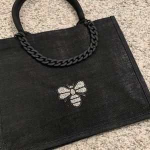 Black chain silver bee